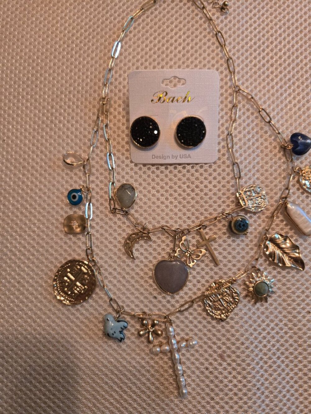 Double strand gold tone charm necklace with black pave stud, classy looking set